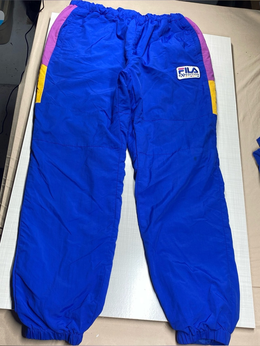 Fila Expedition windbreaker pants medium blue lined zippered pockets